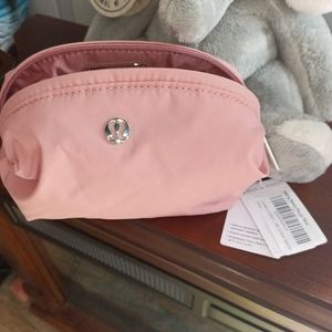LULULEMON FEELING READY MINI POUCH GOLDEN APRICOT